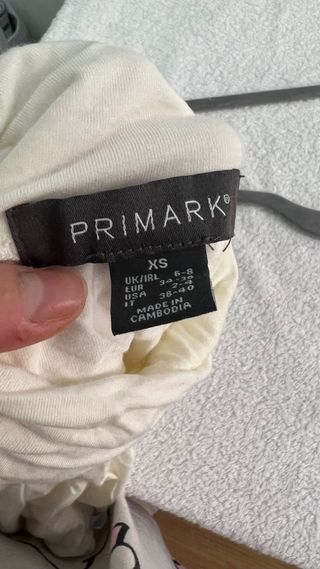 Camiseta blanca cuello alto manga larga