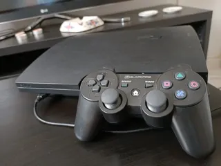 Playstation 3 Negra + 9 Juegos