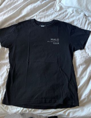 camiseta gira mil batallas tour Malú