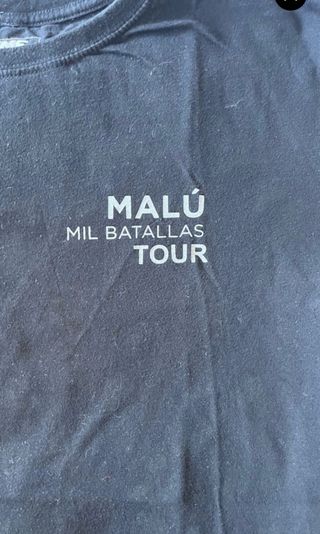 camiseta gira mil batallas tour Malú