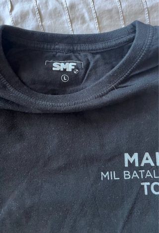 camiseta gira mil batallas tour Malú