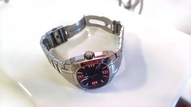 !! NEGOCIABLE !! Reloj Lotus Doom Naranja y Platea