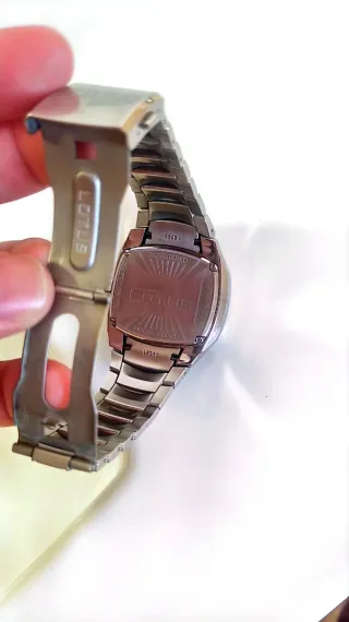 !! NEGOCIABLE !! Reloj Lotus Doom Naranja y Platea