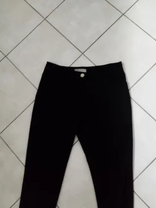 Pantaloni neri tessuto tecnico bottoni oro