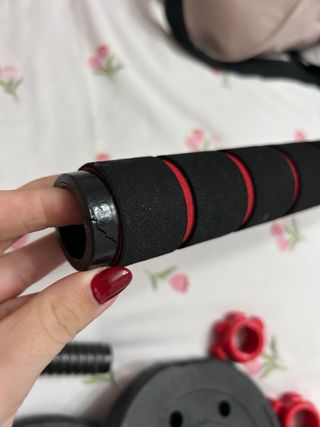 Manubri regolabili e barra di pesi