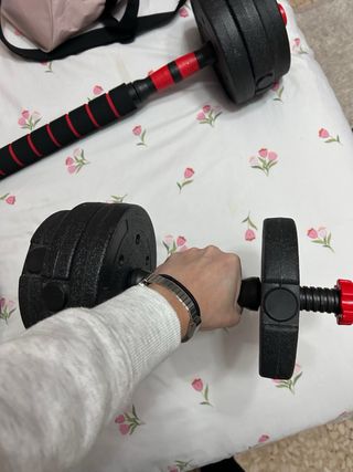 Manubri regolabili e barra di pesi