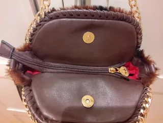 Bolso de pelo marrón y negro