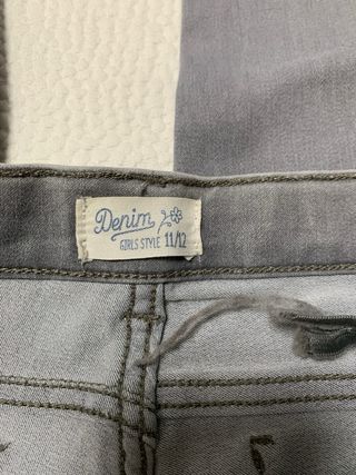 Vaqueros grises con tachuelas