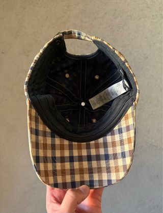 Gorra Aquascutum cuadros azul y marrón