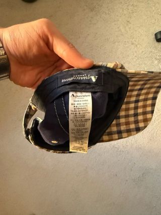 Gorra Aquascutum cuadros azul y marrón