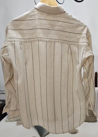 Camisa de rayas beige y negra