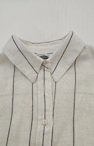 Camisa de rayas beige y negra