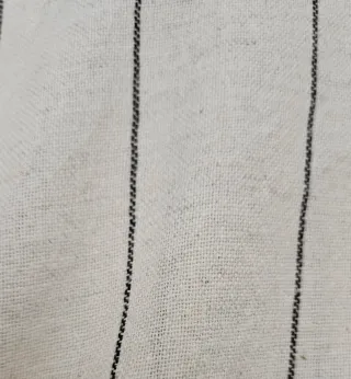 Camisa de rayas beige y negra