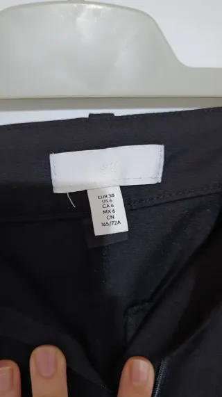 Pantalón negro campana largo de pinza