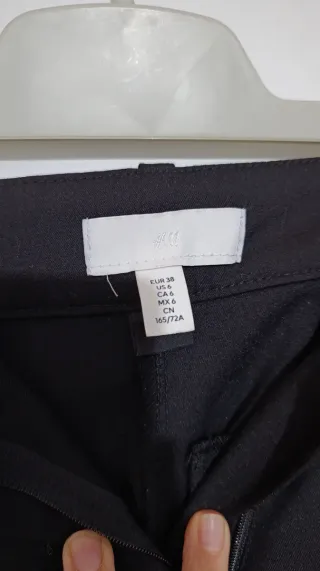 Pantalón negro campana largo de pinza