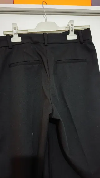 Pantalón negro campana largo de pinza