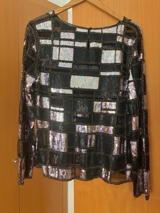 Blusa fiesta lentejuelas , que capta la luz