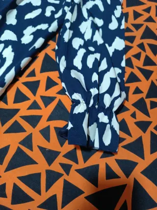 Blusa TL con estampado animal print