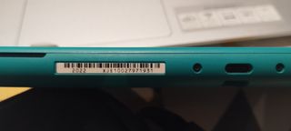 Nintendo Switch Lite 2022 + Custodia + Caricatore + Gioco