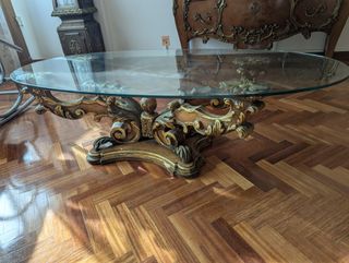 Mesa de centro ovalada cristal y base dorada