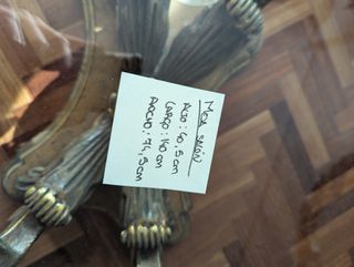 Mesa de centro ovalada cristal y base dorada