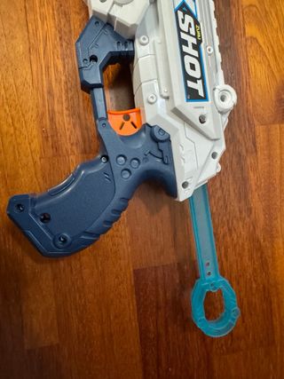 Pistola X-Shot con tambor rotatorio