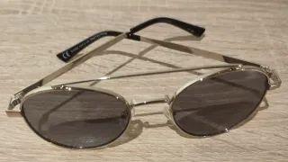 Gafas de sol redondas plateadas