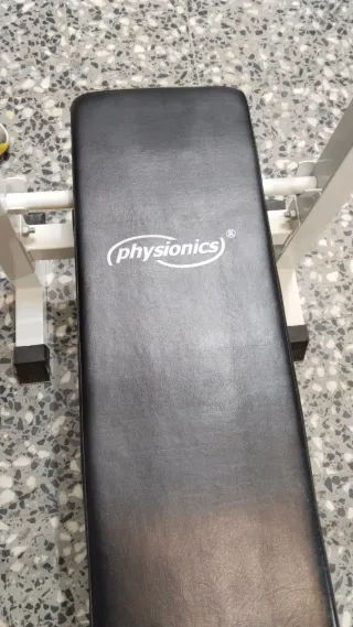 Banco de ejercicios plegable con pesas