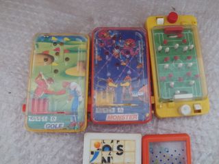 Lotteria di giochi: calcio balilla, biliardino, pinball, monster e golf di Obertoys, giochi d'abilità e altro