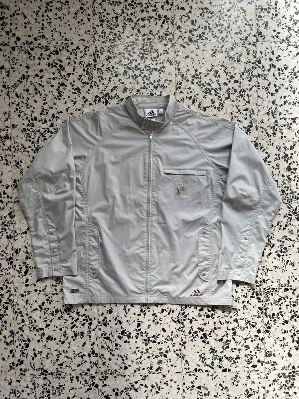 Giacca Adidas Light Grey Utility Track con chiusura a scatto