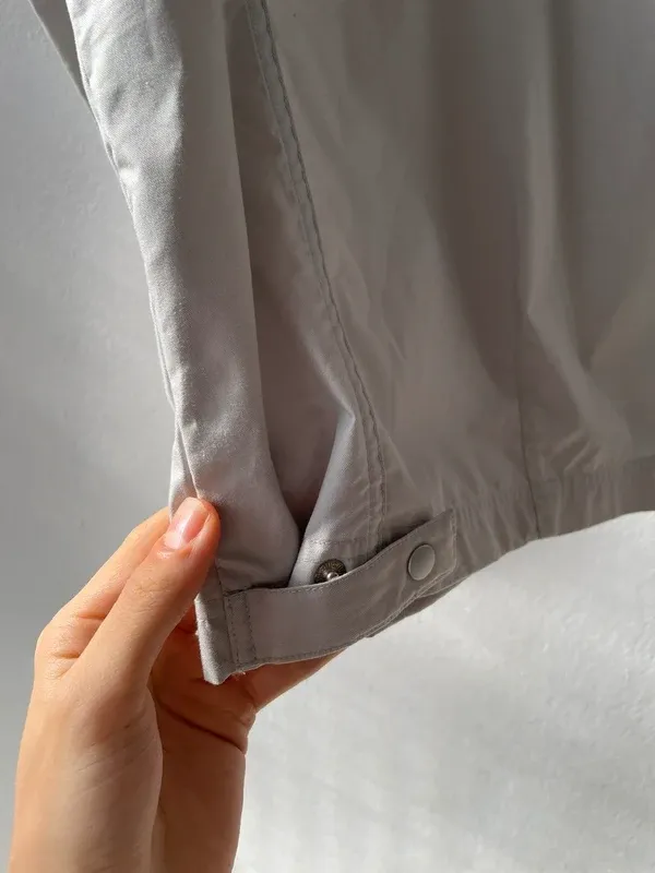 Giacca Adidas Light Grey Utility Track con chiusura a scatto