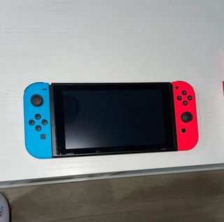 Nintendo Switch + Accesorios y Juegos