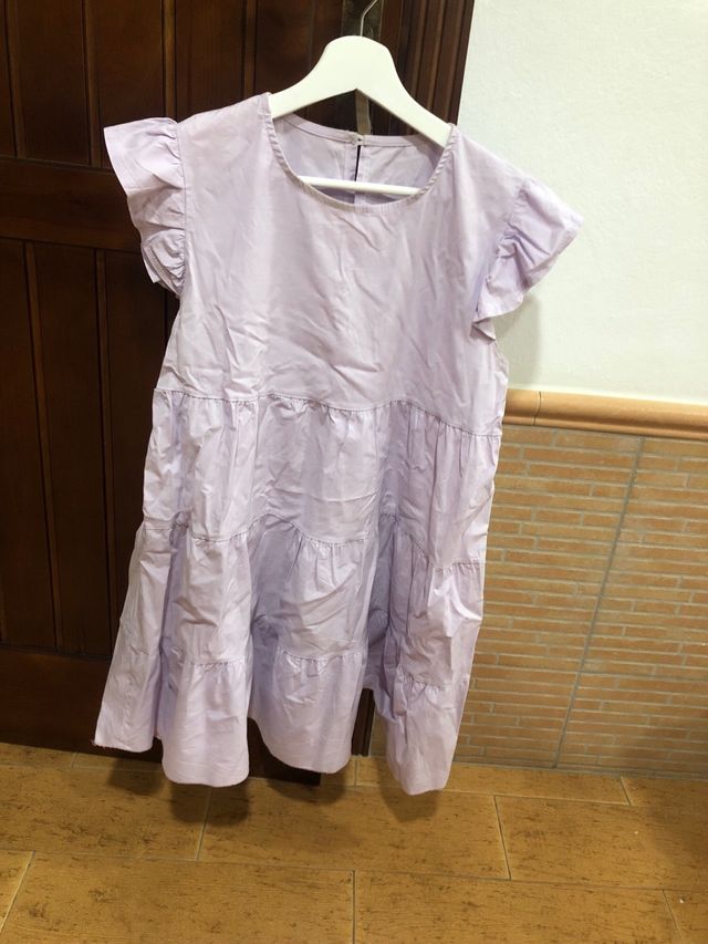 Abito viola con volant