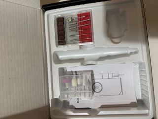 Torno para uñas eléctrico los accesorios sin usar