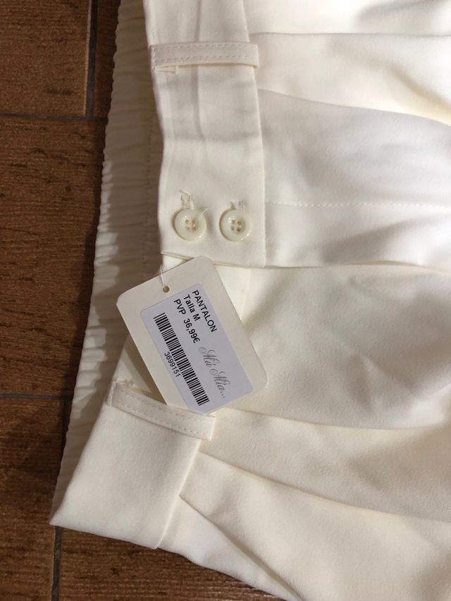 Pantaloni donna beige taglia M con etichetta