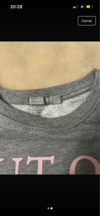 Sudadera gris con diseño de planeta