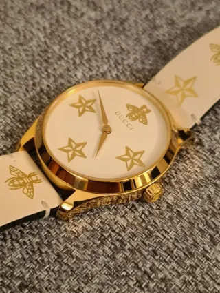Reloj Gucci Dorado y Blanco