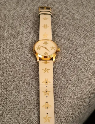 Reloj Gucci Dorado y Blanco