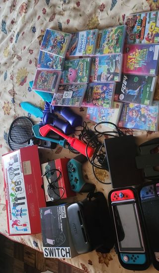 Nintendo Switch + Accessori e Giochi