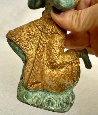 Antica statuina in bronzo