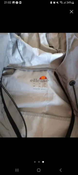 Sudadera ellesse plateada y negra