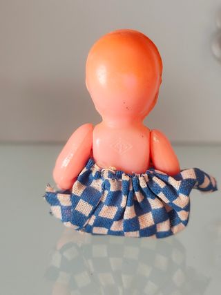 Bambola celluloide anni 60 occhi mobili