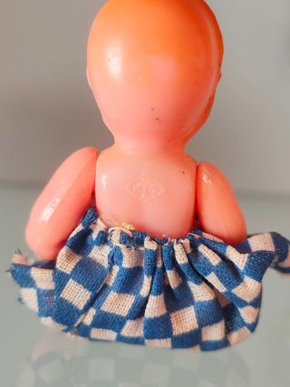 Bambola celluloide anni 60 occhi mobili