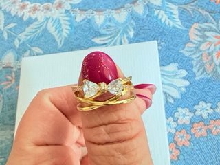 Anillo Pandora triple banda cruzada lazo brillante