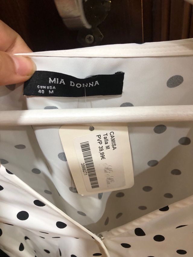 Maglietta a pois bianco e nero