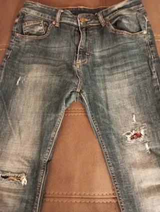 Jeans donna blu strappati