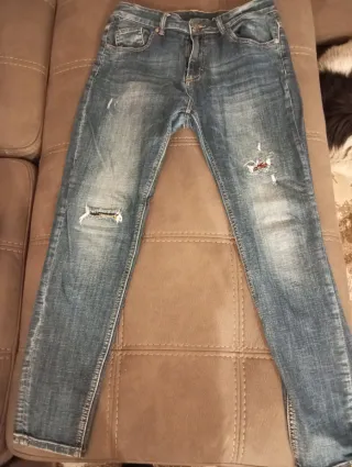 Jeans donna blu strappati