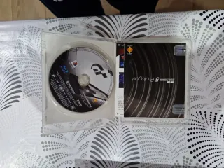 Consola PS3 Super Slim Negra + Juego