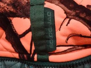 Chaqueta camuflaje naranja y marrón Marca solognac