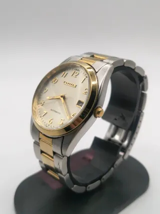 Reloj Citizen Automático Oro y Plata